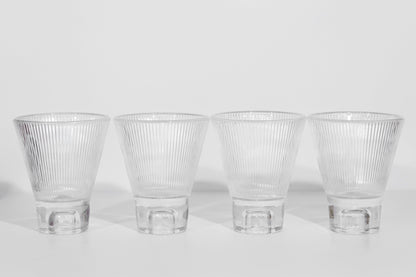 Four clear ZAI tumblers
