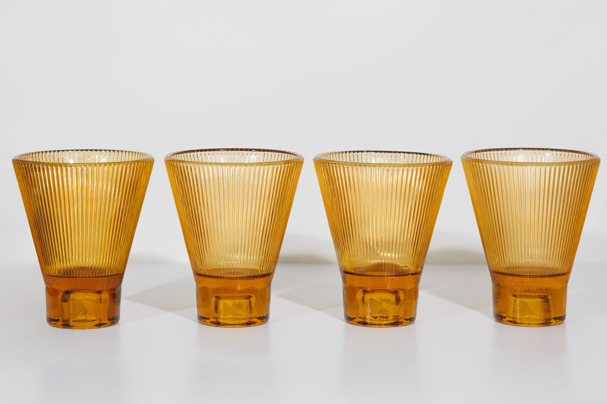 Four amber ZAI tumblers