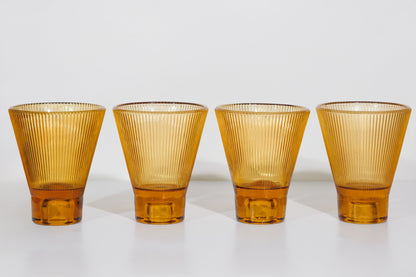 Four amber ZAI tumblers