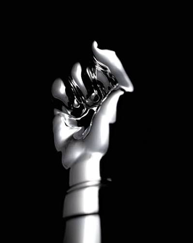Close view of the Amí Brandy hand-shaped bottle design