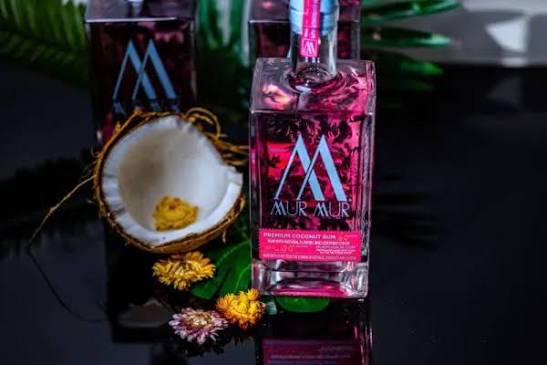 mur mur premium coconut rum with fresh coconut and tropical flowers