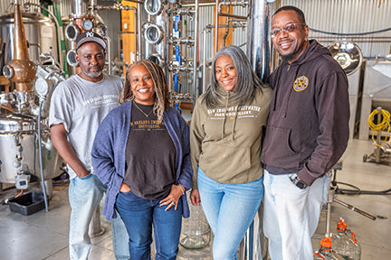 new england sweetwater team inside the distillery